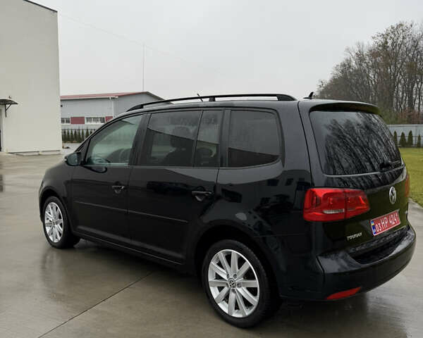 Черный Фольксваген Туран, объемом двигателя 1.4 л и пробегом 201 тыс. км за 7800 $, фото 5 на Automoto.ua