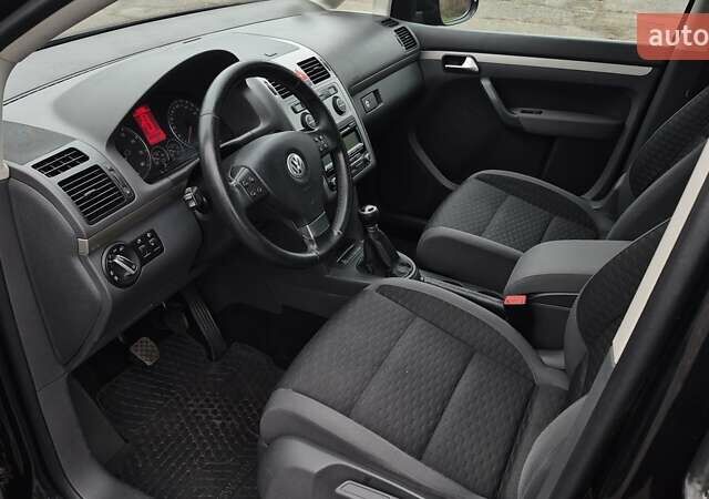 Чорний Фольксваген Туран, об'ємом двигуна 1.4 л та пробігом 248 тис. км за 7699 $, фото 12 на Automoto.ua