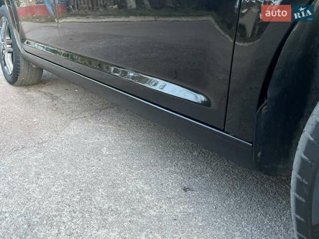 Черный Фольксваген Туран, объемом двигателя 1.4 л и пробегом 238 тыс. км за 7888 $, фото 95 на Automoto.ua