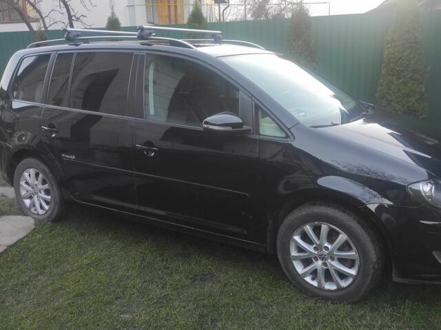 Чорний Фольксваген Туран, об'ємом двигуна 0 л та пробігом 207 тис. км за 8352 $, фото 8 на Automoto.ua