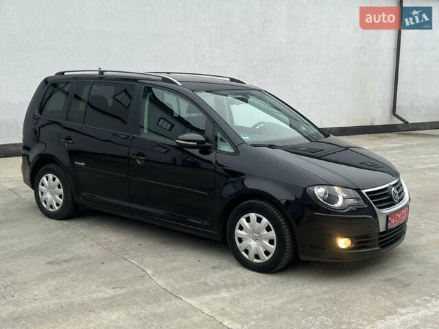 Черный Фольксваген Туран, объемом двигателя 1.4 л и пробегом 213 тыс. км за 8100 $, фото 32 на Automoto.ua