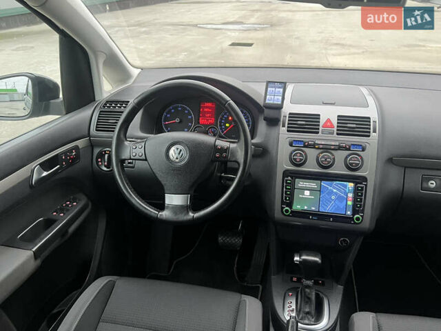 Черный Фольксваген Туран, объемом двигателя 1.4 л и пробегом 213 тыс. км за 8100 $, фото 50 на Automoto.ua