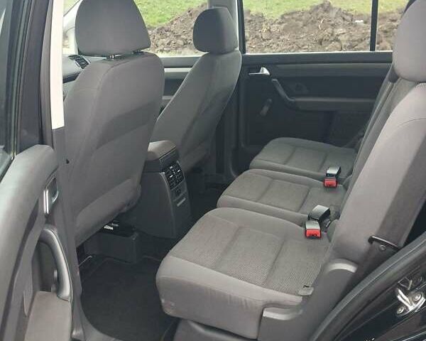 Черный Фольксваген Туран, объемом двигателя 1.6 л и пробегом 249 тыс. км за 7999 $, фото 29 на Automoto.ua