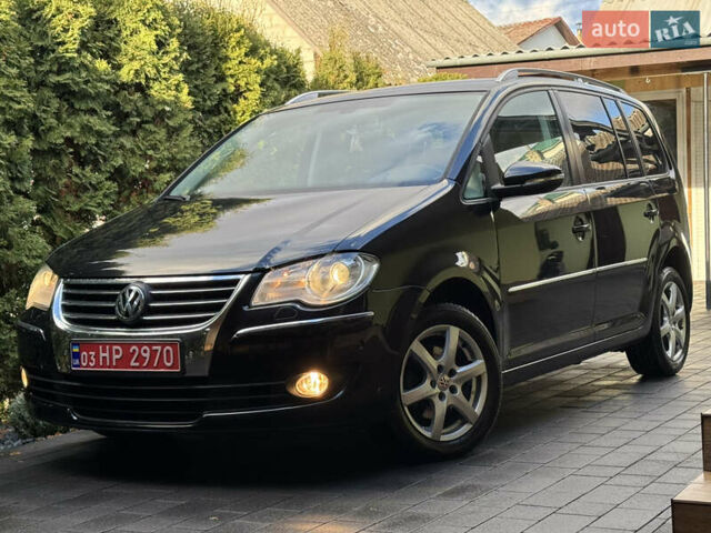 Черный Фольксваген Туран, объемом двигателя 1.4 л и пробегом 199 тыс. км за 7999 $, фото 12 на Automoto.ua