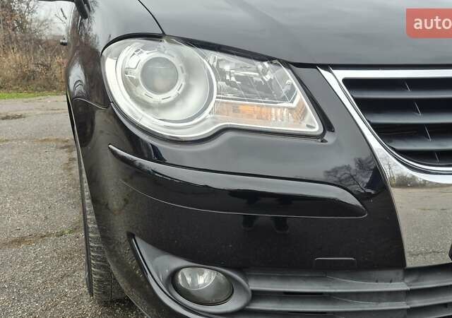 Чорний Фольксваген Туран, об'ємом двигуна 1.4 л та пробігом 248 тис. км за 7699 $, фото 9 на Automoto.ua