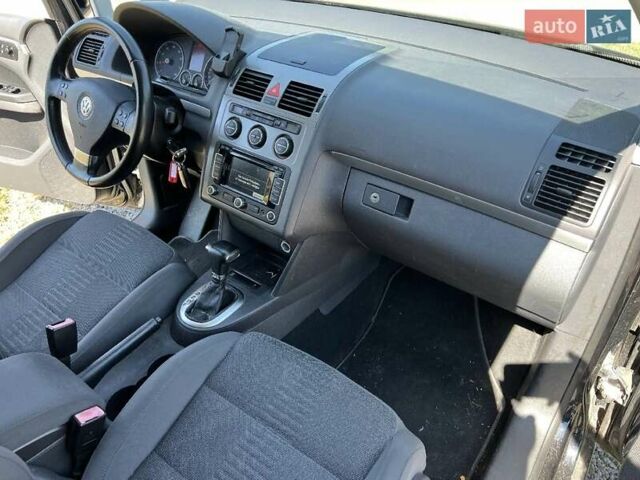 Черный Фольксваген Туран, объемом двигателя 1.4 л и пробегом 238 тыс. км за 7888 $, фото 266 на Automoto.ua