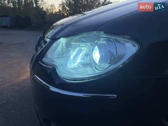 Черный Фольксваген Туран, объемом двигателя 1.4 л и пробегом 238 тыс. км за 7888 $, фото 105 на Automoto.ua