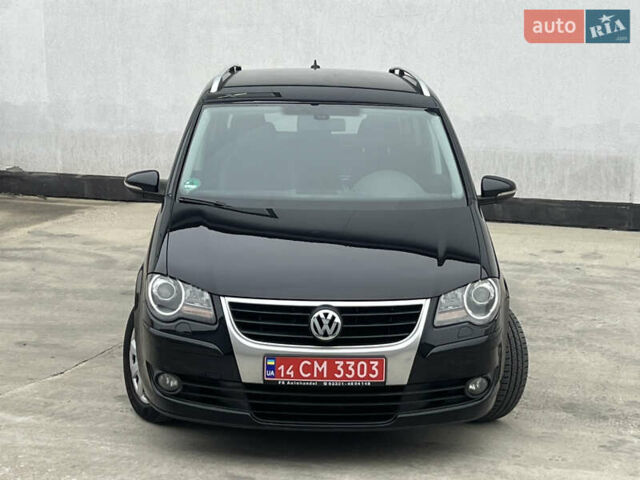 Черный Фольксваген Туран, объемом двигателя 1.4 л и пробегом 213 тыс. км за 8100 $, фото 5 на Automoto.ua