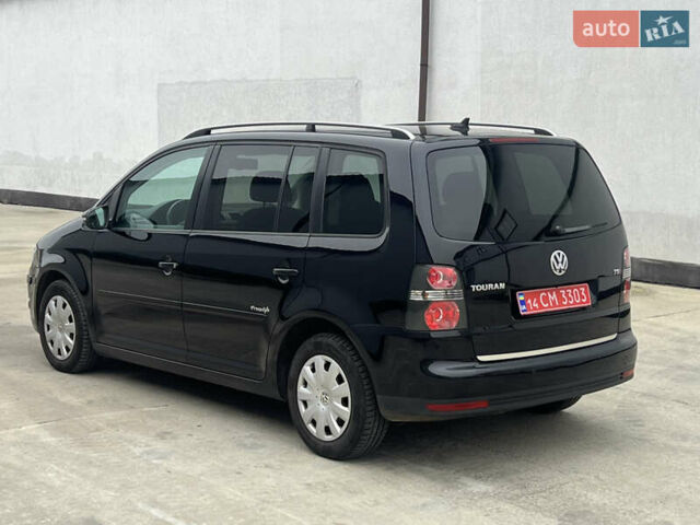 Черный Фольксваген Туран, объемом двигателя 1.4 л и пробегом 213 тыс. км за 8100 $, фото 29 на Automoto.ua