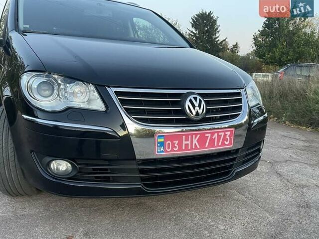 Черный Фольксваген Туран, объемом двигателя 1.4 л и пробегом 238 тыс. км за 7888 $, фото 23 на Automoto.ua