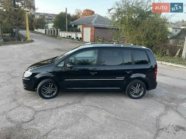 Черный Фольксваген Туран, объемом двигателя 1.4 л и пробегом 238 тыс. км за 7888 $, фото 39 на Automoto.ua