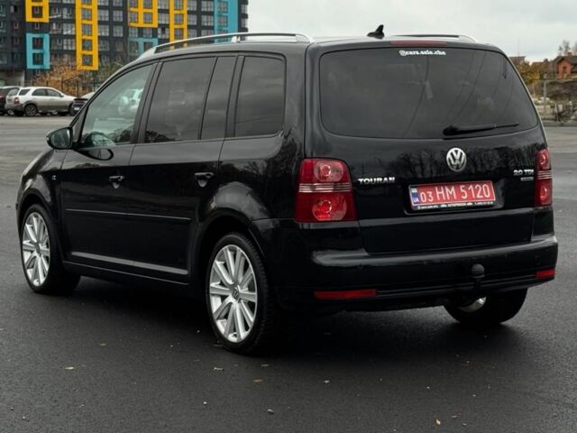 Черный Фольксваген Туран, объемом двигателя 2 л и пробегом 260 тыс. км за 9950 $, фото 2 на Automoto.ua