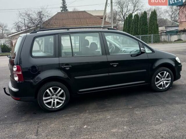 Черный Фольксваген Туран, объемом двигателя 1.6 л и пробегом 249 тыс. км за 7999 $, фото 22 на Automoto.ua