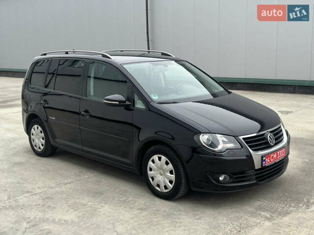 Черный Фольксваген Туран, объемом двигателя 1.4 л и пробегом 213 тыс. км за 8100 $, фото 3 на Automoto.ua