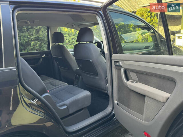 Черный Фольксваген Туран, объемом двигателя 1.4 л и пробегом 199 тыс. км за 7999 $, фото 28 на Automoto.ua