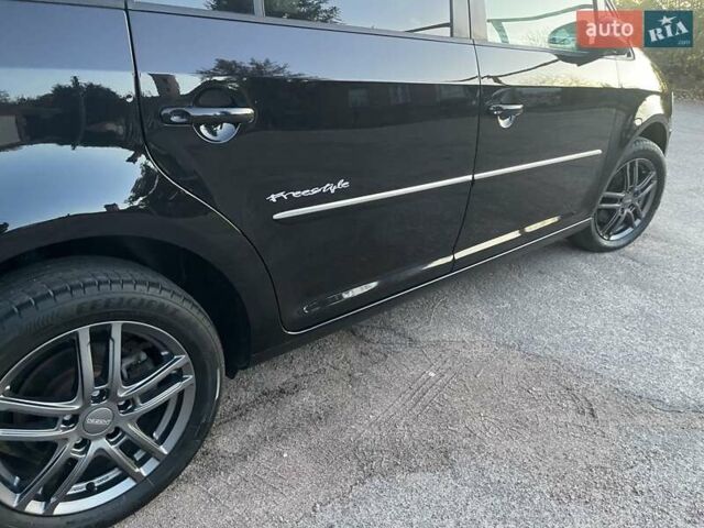 Черный Фольксваген Туран, объемом двигателя 1.4 л и пробегом 238 тыс. км за 7888 $, фото 101 на Automoto.ua