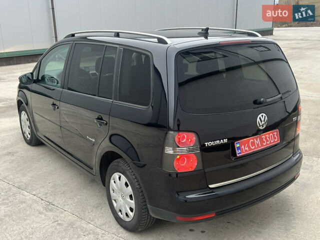 Черный Фольксваген Туран, объемом двигателя 1.4 л и пробегом 213 тыс. км за 8100 $, фото 7 на Automoto.ua