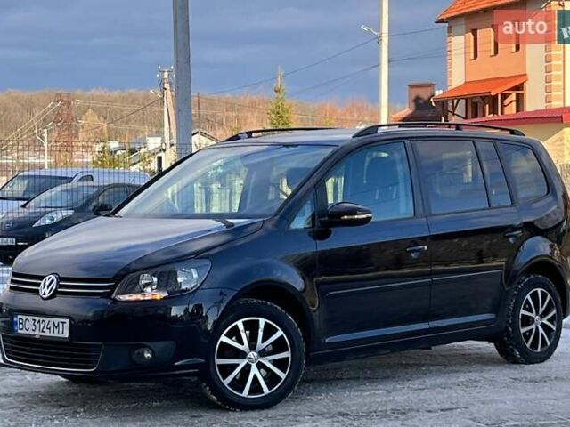 Чорний Фольксваген Туран, об'ємом двигуна 1.4 л та пробігом 187 тис. км за 6999 $, фото 1 на Automoto.ua