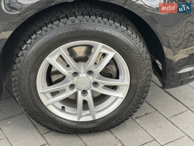 Черный Фольксваген Туран, объемом двигателя 1.4 л и пробегом 227 тыс. км за 8950 $, фото 57 на Automoto.ua