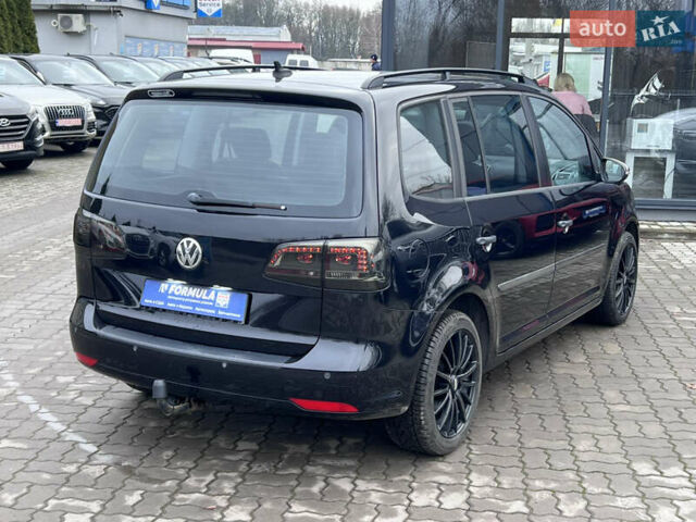 Черный Фольксваген Туран, объемом двигателя 1.4 л и пробегом 235 тыс. км за 8990 $, фото 42 на Automoto.ua