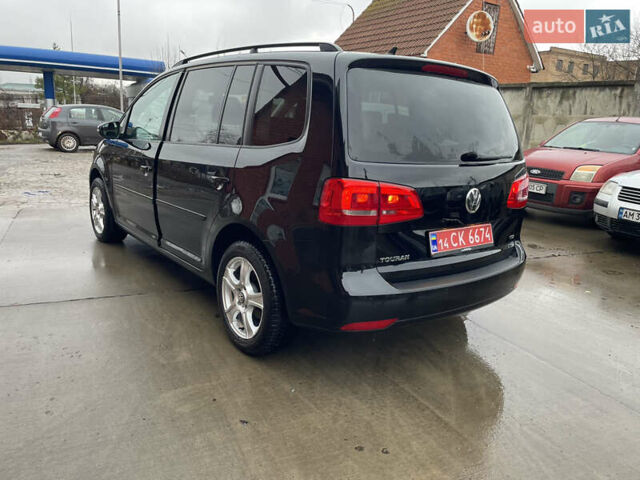 Черный Фольксваген Туран, объемом двигателя 1.6 л и пробегом 333 тыс. км за 9300 $, фото 2 на Automoto.ua