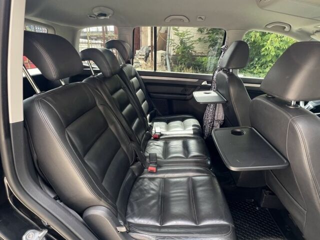 Черный Фольксваген Туран, объемом двигателя 1.4 л и пробегом 233 тыс. км за 6950 $, фото 6 на Automoto.ua