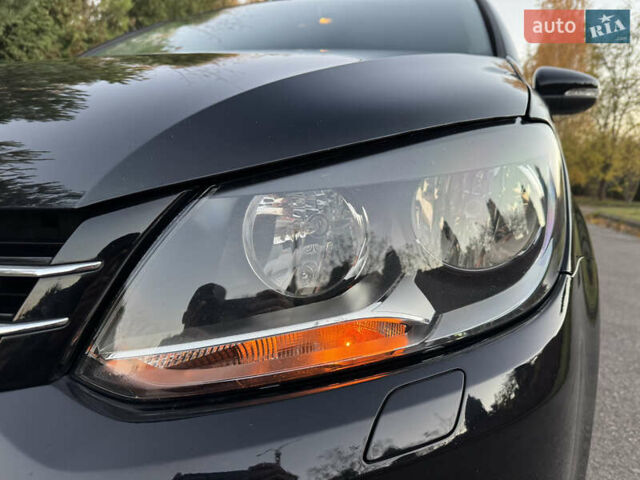 Черный Фольксваген Туран, объемом двигателя 1.6 л и пробегом 185 тыс. км за 11300 $, фото 23 на Automoto.ua