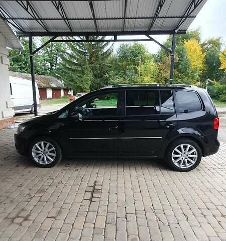 Черный Фольксваген Туран, объемом двигателя 1.98 л и пробегом 255 тыс. км за 12400 $, фото 29 на Automoto.ua