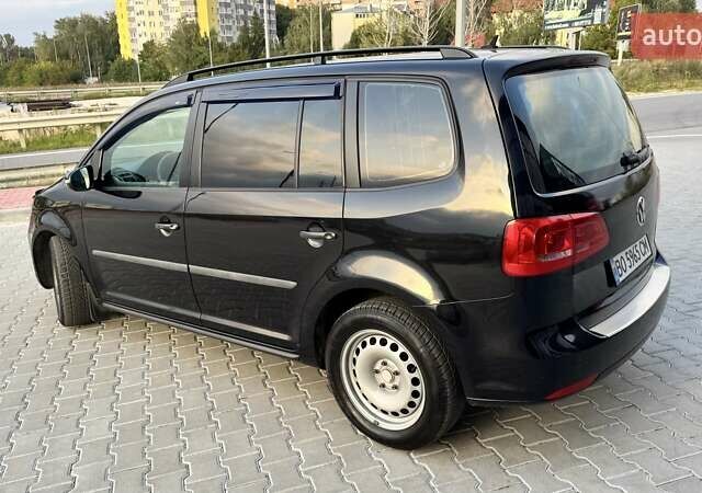 Черный Фольксваген Туран, объемом двигателя 1.6 л и пробегом 256 тыс. км за 8999 $, фото 4 на Automoto.ua