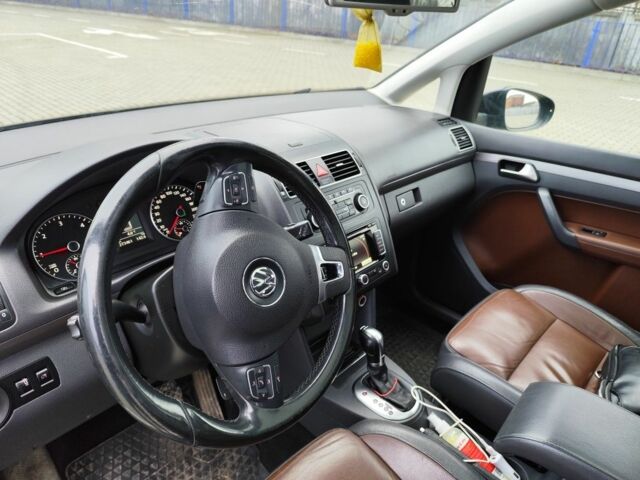 Чорний Фольксваген Туран, об'ємом двигуна 2 л та пробігом 273 тис. км за 8700 $, фото 21 на Automoto.ua