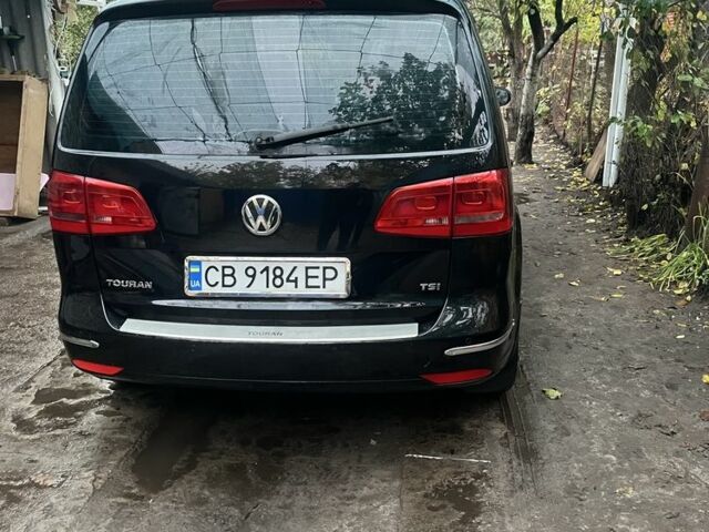 Черный Фольксваген Туран, объемом двигателя 1.4 л и пробегом 175 тыс. км за 7500 $, фото 1 на Automoto.ua