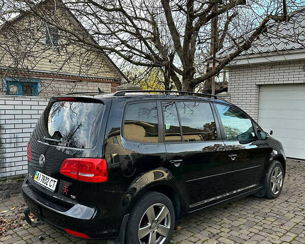 Черный Фольксваген Туран, объемом двигателя 1.39 л и пробегом 99 тыс. км за 11399 $, фото 2 на Automoto.ua