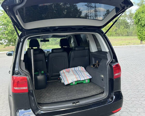 Черный Фольксваген Туран, объемом двигателя 1.39 л и пробегом 251 тыс. км за 7200 $, фото 5 на Automoto.ua