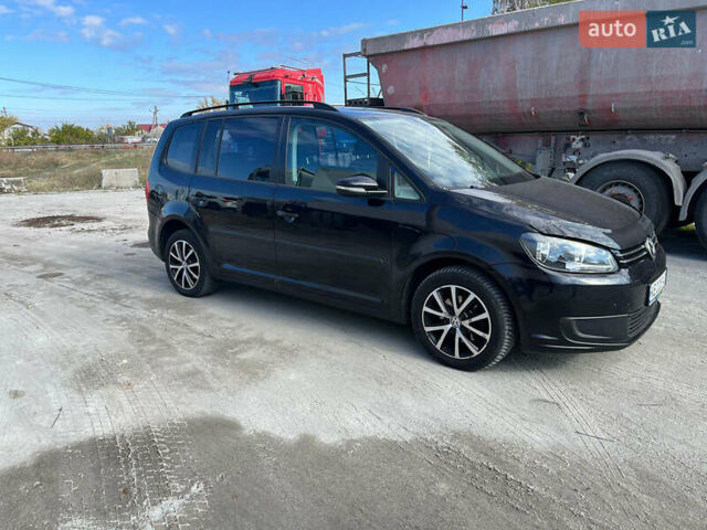 Черный Фольксваген Туран, объемом двигателя 1.6 л и пробегом 280 тыс. км за 9300 $, фото 2 на Automoto.ua