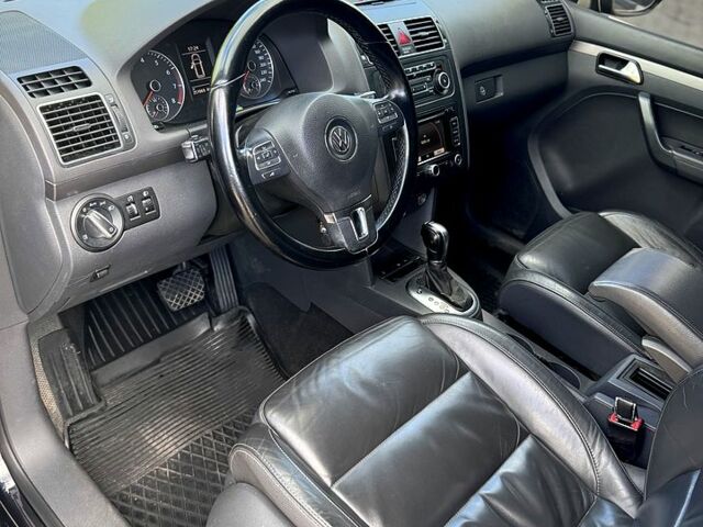 Черный Фольксваген Туран, объемом двигателя 1.4 л и пробегом 251 тыс. км за 8200 $, фото 4 на Automoto.ua