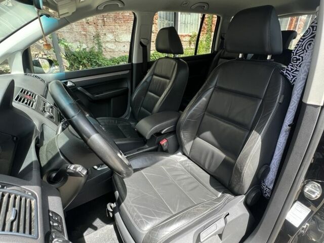 Черный Фольксваген Туран, объемом двигателя 1.4 л и пробегом 233 тыс. км за 6950 $, фото 11 на Automoto.ua