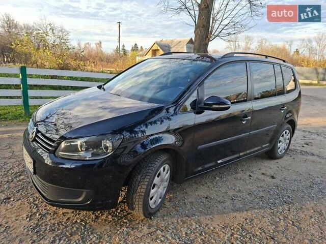 Черный Фольксваген Туран, объемом двигателя 1.6 л и пробегом 275 тыс. км за 9600 $, фото 1 на Automoto.ua