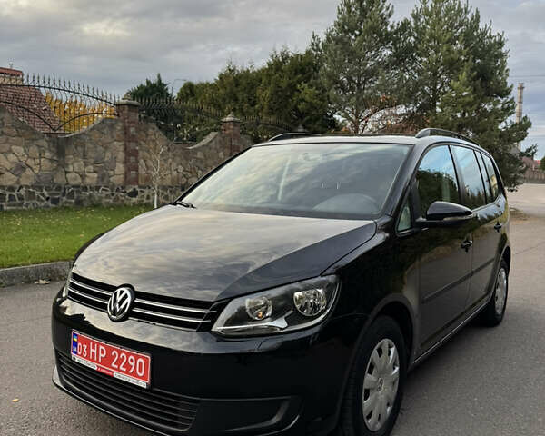 Черный Фольксваген Туран, объемом двигателя 1.6 л и пробегом 185 тыс. км за 11300 $, фото 2 на Automoto.ua