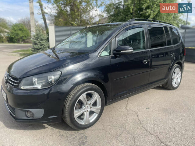 Черный Фольксваген Туран, объемом двигателя 1.39 л и пробегом 236 тыс. км за 8200 $, фото 3 на Automoto.ua