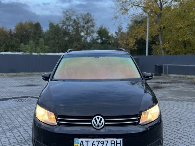 Черный Фольксваген Туран, объемом двигателя 1.4 л и пробегом 233 тыс. км за 6950 $, фото 1 на Automoto.ua