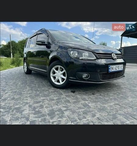 Черный Фольксваген Туран, объемом двигателя 1.4 л и пробегом 223 тыс. км за 7900 $, фото 2 на Automoto.ua