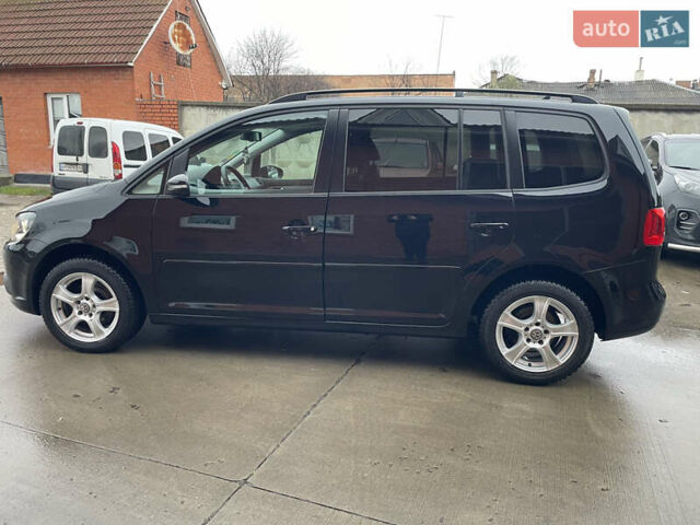 Черный Фольксваген Туран, объемом двигателя 1.6 л и пробегом 333 тыс. км за 9300 $, фото 1 на Automoto.ua