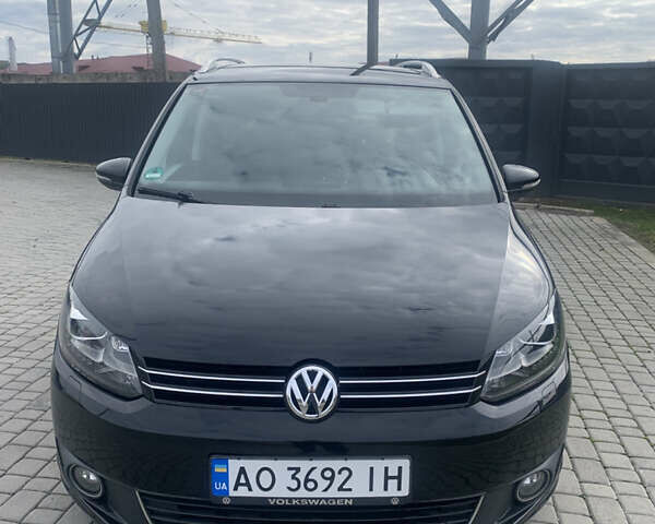 Черный Фольксваген Туран, объемом двигателя 1.97 л и пробегом 205 тыс. км за 12500 $, фото 1 на Automoto.ua