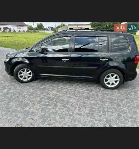 Черный Фольксваген Туран, объемом двигателя 1.4 л и пробегом 223 тыс. км за 7900 $, фото 1 на Automoto.ua