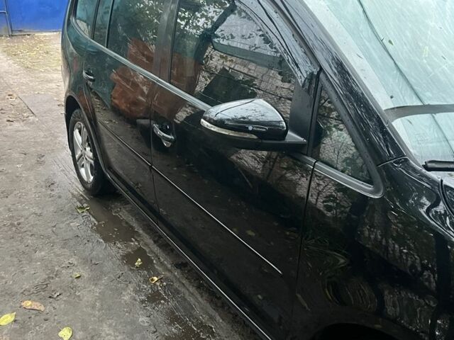 Черный Фольксваген Туран, объемом двигателя 1.4 л и пробегом 175 тыс. км за 7500 $, фото 3 на Automoto.ua