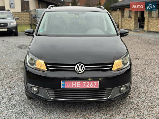 Черный Фольксваген Туран, объемом двигателя 2 л и пробегом 204 тыс. км за 11300 $, фото 1 на Automoto.ua