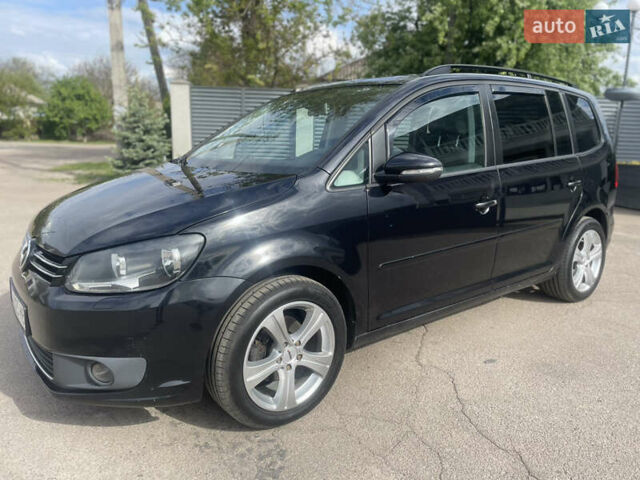 Черный Фольксваген Туран, объемом двигателя 1.39 л и пробегом 236 тыс. км за 8200 $, фото 4 на Automoto.ua