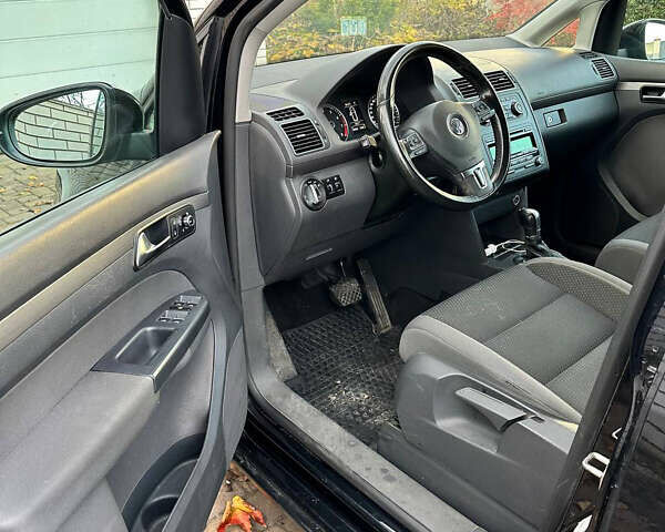 Черный Фольксваген Туран, объемом двигателя 1.39 л и пробегом 99 тыс. км за 11399 $, фото 7 на Automoto.ua