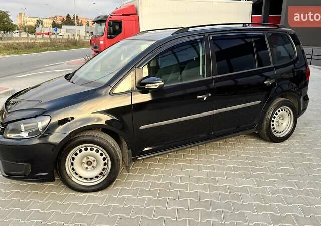 Черный Фольксваген Туран, объемом двигателя 1.6 л и пробегом 256 тыс. км за 8999 $, фото 2 на Automoto.ua