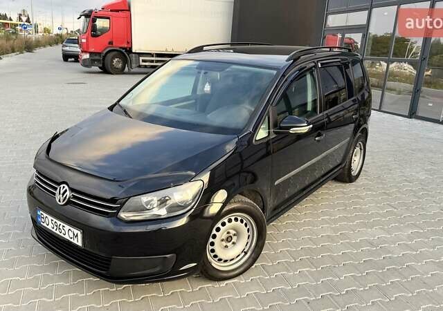 Черный Фольксваген Туран, объемом двигателя 1.6 л и пробегом 256 тыс. км за 8999 $, фото 1 на Automoto.ua